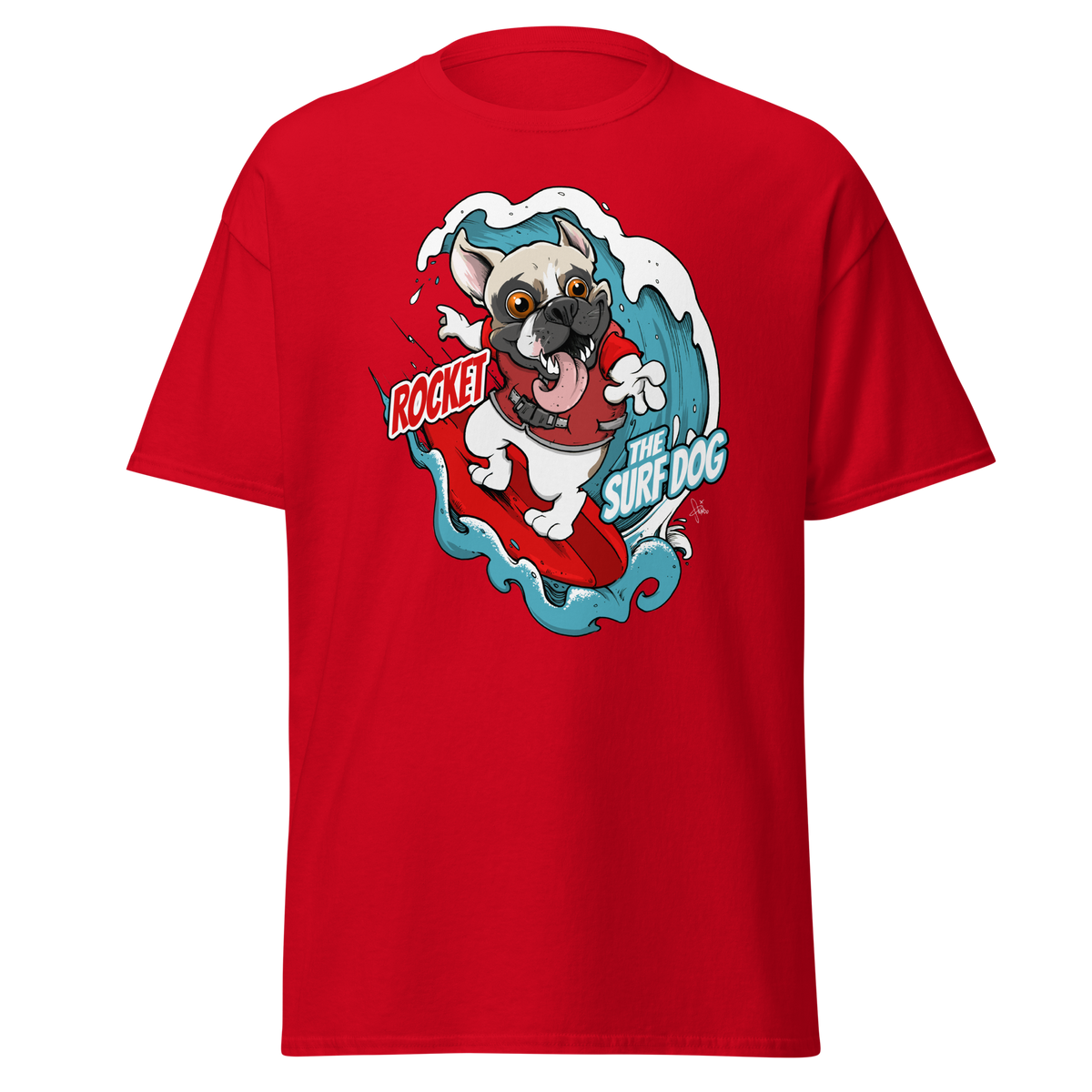 A red short-sleeve crewneck t-shirt featuring a colorful graphic print of a French Bulldog surfing on a red surfboard with the text 'ROCKET THE SURF DOG.'