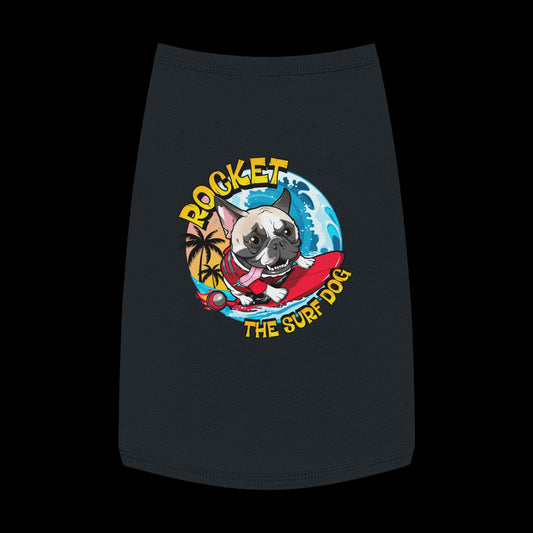 A black pet shirt featuring a colorful graphic of a French Bulldog surfing on a red board with the text 'ROCKET THE SURF DOG' in yellow and blue.