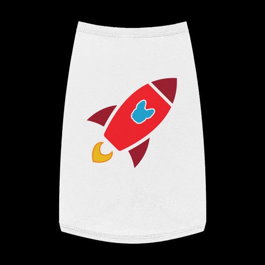 A white pet shirt with a colorful cartoon rocket graphic on the front, displayed against a solid black background.