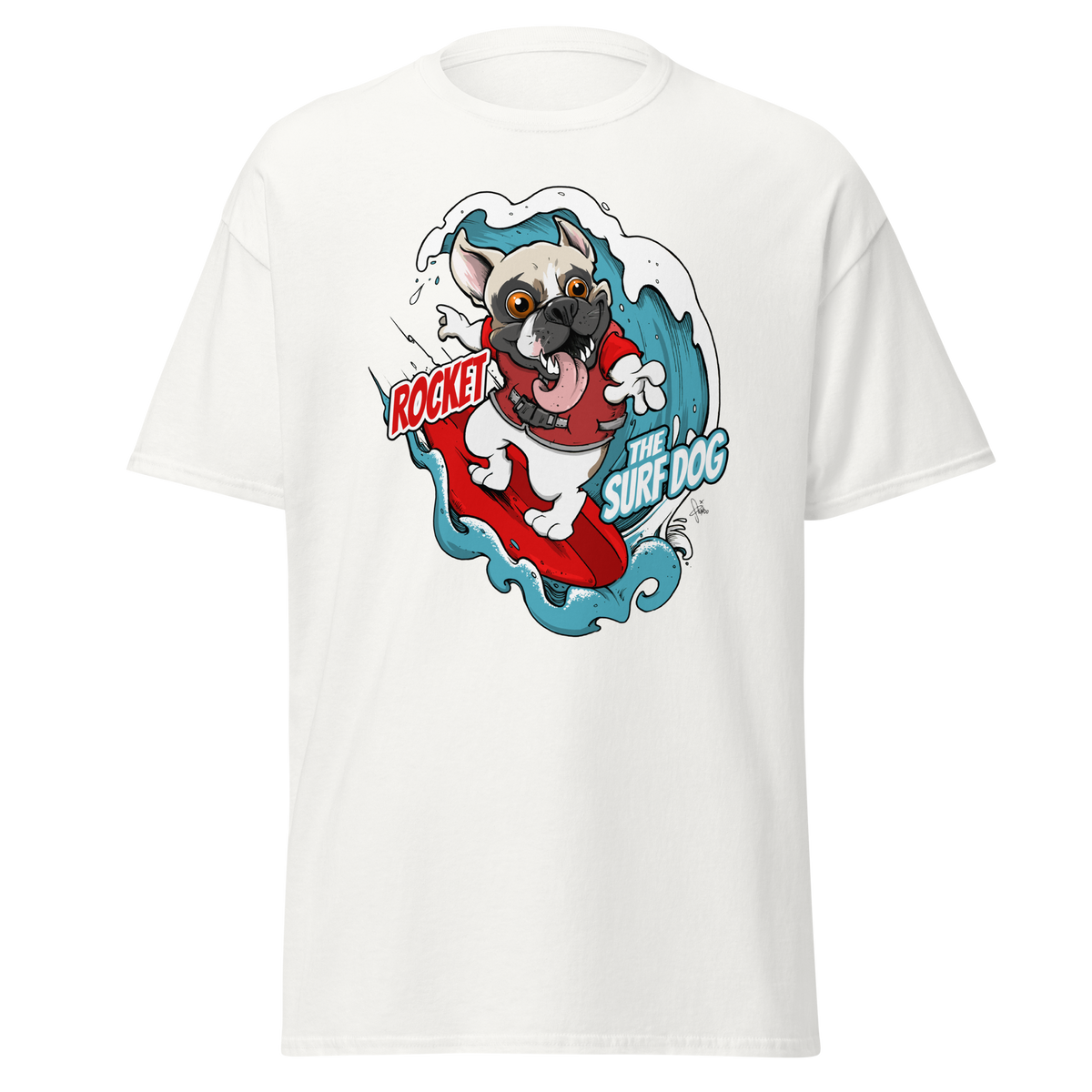 A white short-sleeve crewneck t-shirt featuring a colorful graphic print of a French Bulldog surfing on a red surfboard with the text 'ROCKET THE SURF DOG.'