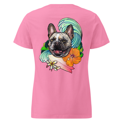 A pink short-sleeve t-shirt shown from the back, featuring a large graphic print of a French Bulldog surrounded by a turquoise wave, an orange hibiscus flower, and a pink surfboard.