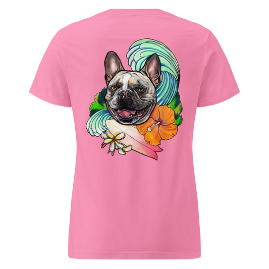A pink short-sleeve t-shirt shown from the back, featuring a large graphic print of a French Bulldog surrounded by a turquoise wave, an orange hibiscus flower, and a pink surfboard.