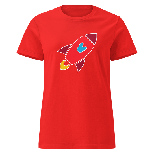 A red short-sleeve crewneck t-shirt featuring a cartoon rocket ship graphic on the chest. The rocket has a light blue Frenchie-shaped window, maroon panels, and a small yellow flame exhaust.